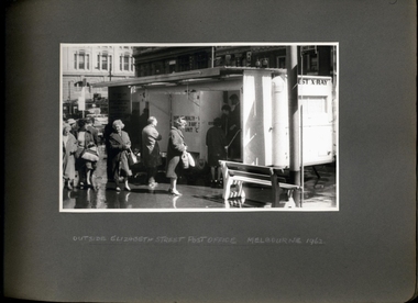 Photograph, Anti Tuberculosis Campaign - People queuing & exiting X-ray caravan on a wet day outside Elizabeth St Post Office Melbourne 1962 - Department of Health - Tuberculosis Branch - Chest X-Ray Surveys program