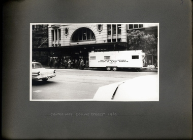 Photograph, X-ray caravan outside of the Centreway Arcade on Collins St 1962 - Department of Health - Tuberculosis Branch - Chest X-Ray Surveys program