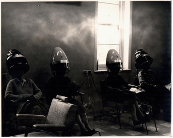 Photograph, Photo of patients having their hair dried under hair dryers, in a beauty parlour setting at Caloola - previously Sunbury  Mental Hospital, Sunbury - Circa 1964