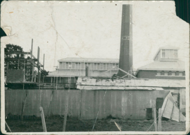 Photograph, Photo showing construction of new buildings & boiler room chimney at Caloola Training Centre Sunbury - Black & White Photo