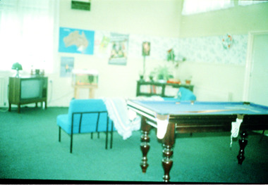 Photograph, A photograph of a games room at Winlaton with lounge chairs, tv, and a snooker table - Winlaton