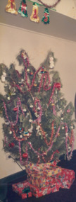 Photograph, Bundoora Repatriation Hospital - Day Centre - Decorated Xmas tree with presents underneath - Bundoora Repatriation Hospital - Day Centre - Photographs taken by Patients ( Series 59 ) - Parties & Outings - 1986 To 1992