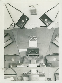 Photograph, Handbags and purses displayed in an exhibit of leather items made by patients at Gresswell Sanitorium as a contribution to the war effort circa June 1946 - Mont Park