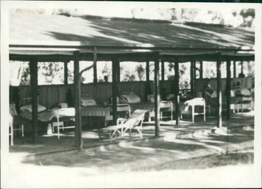 Photograph, A view of an open air ward with tuberculosis (TB) patients able to access fresh air either in available beds or deck chairs outside at Gresswell Sanitorium - Mont Park