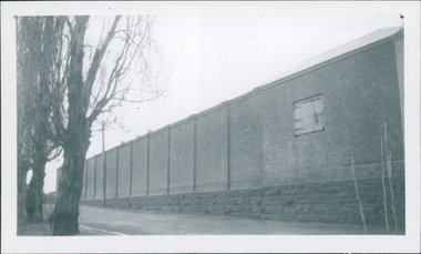 Photograph, Stepped, high, curved wall surrounding J Ward at Aradale / Ararat Hospital - Black & White Photo