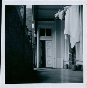 Photograph, Bedding being aired on the North verandah, looking East, on the ground floor of the Ballarat Base Hospital, photo take on 13/02/1959 - 4 of 4 photos - Regional & District Hospital Collection - Department of Health & Human Services (DHHS)