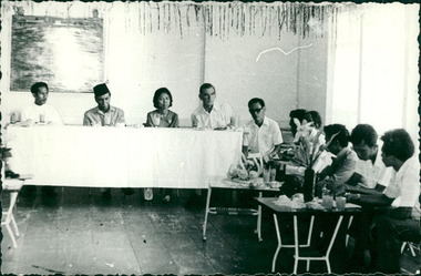 Photograph, Officials and medical staff and Australian contingent in informal discussions & settings inside the Hospital, Dr Forbes 4th from left - Dr John A Forbes Fairfield / Gull Force 2/21 Bn AIF / Ziarah Caltex & Rumah Sakit Ambon Hospital - Photo is from Dr John Forbes photo albums - 1971