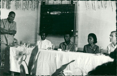 Photograph, Officials and medical staff, and Dr Forbes, engaged in informal discussions inside the Hospital,  - Dr John A Forbes Fairfield / Gull Force 2/21 Bn AIF / Ziarah Caltex & Rumah Sakit Ambon Hospital - Photo is from Dr John Forbes photo albums - 1971
