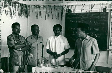 Photograph, Officials and medical staff in informal discussions & settings inside the Hospital - Dr John A Forbes Fairfield / Gull Force 2/21 Bn AIF / Ziarah Caltex & Rumah Sakit Ambon Hospital - Photo is from Dr John Forbes photo albums - 1971