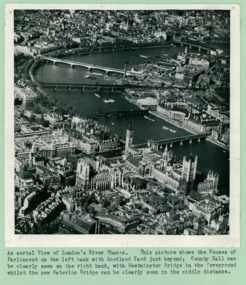 An aerial view of London's River Thames, The Houses of Parliament, and Big Ben - Department of Health – National Fitness Office (Sports & Recreation) – Historical Press Release Photo Collection