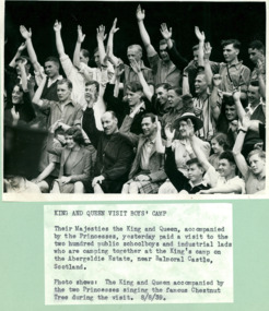 The King and Queen and Princesses singing with public & industrial schoolboys at the King's camp Abergeldie Estate near Balmoral - Department of Health – National Fitness Office (Sports & Recreation) – Historical Press Release Photo Collection