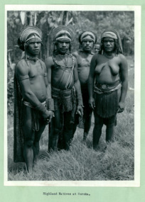 Highland indigenous people, at Goroka, Papua New Guinea, with their tribal headdress on - Department of Health – National Fitness Office (Sports & Recreation) – Historical Press Release Photo Collection