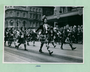 Highland Guides, Cubs and Brownies march past Melbourne Town Hall Swanston Street, Melbourne CBD Australia, from the War Memorial in 1954 - Department of Health – National Fitness Office (Sports & Recreation) – Historical Press Release Photo Collection