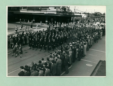 Girl Guides crossing Flinders Street next to Princes Bridge Station marching towards the Melbourne Town Hall on Swanston Street, Melbourne CBD Australia, from the War Memorial - Department of Health – National Fitness Office (Sports & Recreation) – Historical Press Release Photo Collection