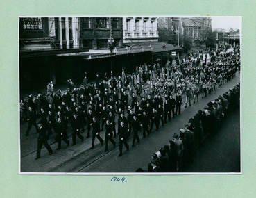 Air Cadets, Girl Guides and Catholic groups in between Flinders and Bourke Streets marching towards the Melbourne Town Hall on Swanston Street, Melbourne CBD Australia, from the War Memorial 1949 - Department of Health – National Fitness Office (Sports & Recreation) – Historical Press Release Photo Collection