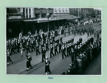 Sea and Army Cadets in between Flinders and Bourke Streets marching towards the Melbourne Town Hall on Swanston Street, Melbourne CBD Australia, from the War Memorial 1949 - Department of Health – National Fitness Office (Sports & Recreation) – Historical Press Release Photo Collection