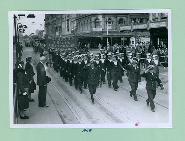 Sea Cadets taking the salute followed by the Methodist Youth Fellowship in front of the salute base at the Melbourne Town Hall on Swanston Street, Melbourne CBD Australia - 1948, from the War Memorial - Department of Health – National Fitness Office (Sports & Recreation) – Historical Press Release Photo Collection
