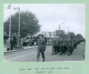 School Cadets taking the salute, passing the  saluting base on Sturt Street Ballarat on Empire Youth day march held in Ballarat on 1958 - Department of Health – National Fitness Office (Sports & Recreation) – Historical Press Release Photo Collection