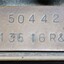 Small metal/copper plate with the serial numbers of the National cash register used in the J. Mann & Sons General Store in Wodonga, Victoria.