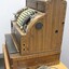 One side of the National cash register used in the J. Mann & Sons General Store in Wodonga, Victoria with a 10 cm scale.