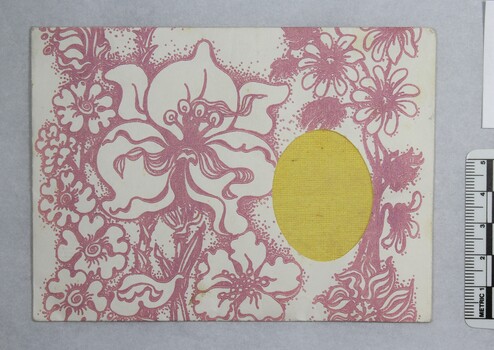 Front of a Sarah Coventry jewellery polishing cloth, with a 5 cm black and white scale.