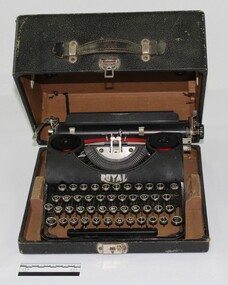 Black vintage typewriter in leather box