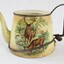 Side view of Haeusler Collection Teapot showing a print of two deer in a woodland by a stream