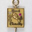 Front of a Sarah Coventry gold metal pin for ten years service, with a faceted pink stone inlay on the proper left side and a faceted clear stone on the proper right side.