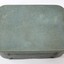 Top surface of a green suitcase for a Sarah Coventry jewellery kit with the name Sarah Coventry in gold lower case letters.