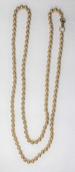 Gold toned beaded metal chain from the Sarah Coventry jewellery range.