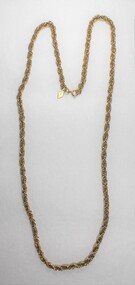 Gold toned metal rope chain from the Sarah Coventry jewellery range, with a small rhombus-shaped attachment at the clasp. 