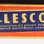 Haeusler Collection Telescope original orange packaging box with images of one man playing golf and one man skiing 