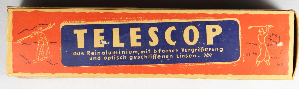 Haeusler Collection Telescope original orange packaging box with images of one man playing golf and one man skiing 