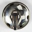 Reverse of Silver toned Dome Shaped Clip on Earrings from the Sarah Coventry Jewellery Range c. 1970s-1980s, showing makers mark