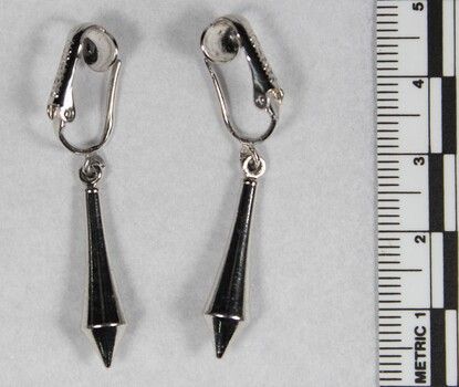 Silver toned Drop Shape Clip on Earrings from the Sarah Coventry Jewellery Range c. 1970s-1980s, with 5cm scale