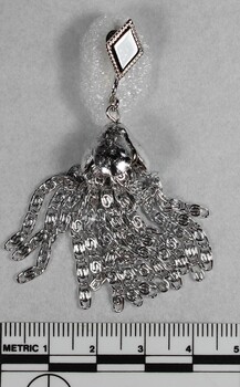 Silver toned Tassel Clip on Earring from the Sarah Coventry Jewellery Range c.1970s-1980s with 5cm scale