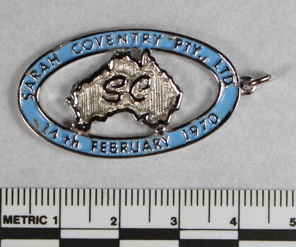Blue and silver toned Commemorative Pendant from the Sarah Coventry Jewellery Range c.1970s-1980s with 5cm scale