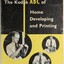 Black and yellow booklet with photographs of man developing photography on the cover. 