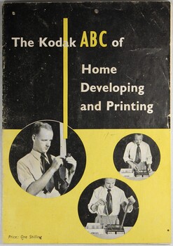 Black and yellow booklet with photographs of man developing photography on the cover. 