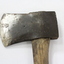 Haeusler Collection Wooden Axe c. early 1900s, detail of steel axe head showing scratches and scuffing marks from use