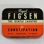 Haeusler Collection Figsen Laxative Tin in white, orange and black, with text on lid
