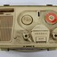 Birds eye view of the reel to reel tape recorder showing rotating knobs 