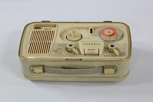 Front view of Haeusler Collection Mid-Century Tape Recorder c. 1961, showing portable case with handle 