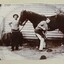 Photo of two men and horse.