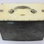 Side view of a rectangular grey metal railways lunch box.