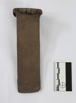 Side of a hand forged iron alloy iron wedge scale.