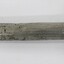 Side view of a metal torch.