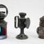 Three metal and glass Signal lamps.