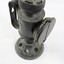 Top view of a black painted metal signal lamp.