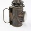 Black painted metal signal lamp with a clear glass lens.
